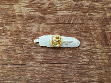 Load image into Gallery viewer, Butterfly clasp on the back of a pin that looks like a feather