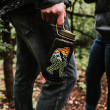 Load image into Gallery viewer, Yeti Nalgene water bottle with big foot design with trees and mountain and the sun
