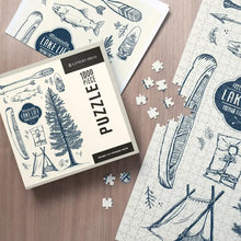 Load image into Gallery viewer, Shows puzzle being put together on table