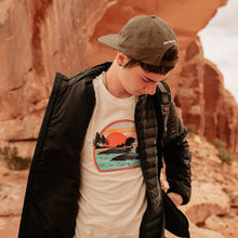 Load image into Gallery viewer, Boy wearing vintage loon t-shirt in front of canyon