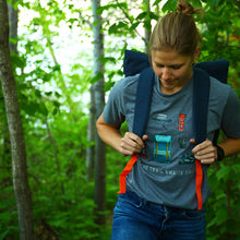 Load image into Gallery viewer, Girl hiking with trey t-shirt on that has hiking icons on it