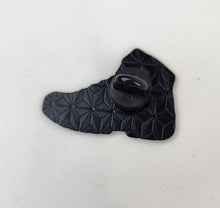 Load image into Gallery viewer, back of hiking boot pin that is black with geometric pattern