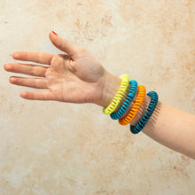 Load image into Gallery viewer, mosquito repellent bracelets on someone's arm