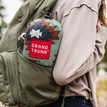 Load image into Gallery viewer, Grand Trunk travel hammock in a side backpack pocket
