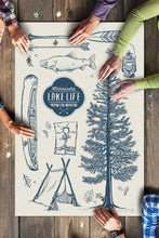 Load image into Gallery viewer, People putting together Minnesota Lake Life puzzle