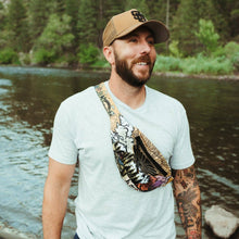 Load image into Gallery viewer, man walking by river with fanny pack around chest