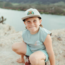 Load image into Gallery viewer, Boy wearing a white camping hat squatting on a rock