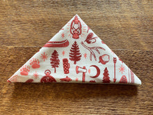Load image into Gallery viewer, Bandana folded into a triangle with lamp, trees, and camping icons