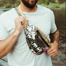Load image into Gallery viewer, man wearing fanny pack with trees, mountains, and clouds