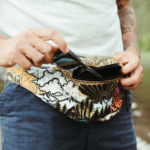 Load image into Gallery viewer, outdoor fanny pack being worn by a man whose pulling sunglasses out