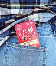 Load image into Gallery viewer, first aid kit in model's back pocket