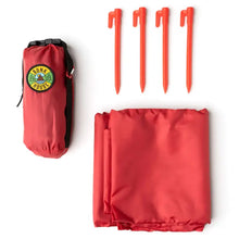 Load image into Gallery viewer, red outdoor mat with stakes to hold in place and carrying pouch