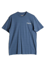 Load image into Gallery viewer, blue t-shirt with Kavu logo on upper left chest