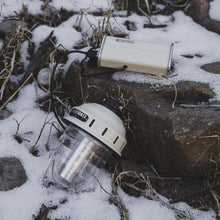Load image into Gallery viewer, white lantern with white power bank sitting in the snow