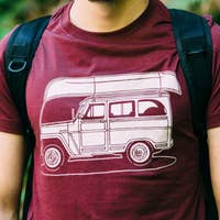 Load image into Gallery viewer, man wearing maroon t-shirt with canoe and jeep