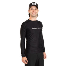 Load image into Gallery viewer, Paddle North paddle shirt on male model