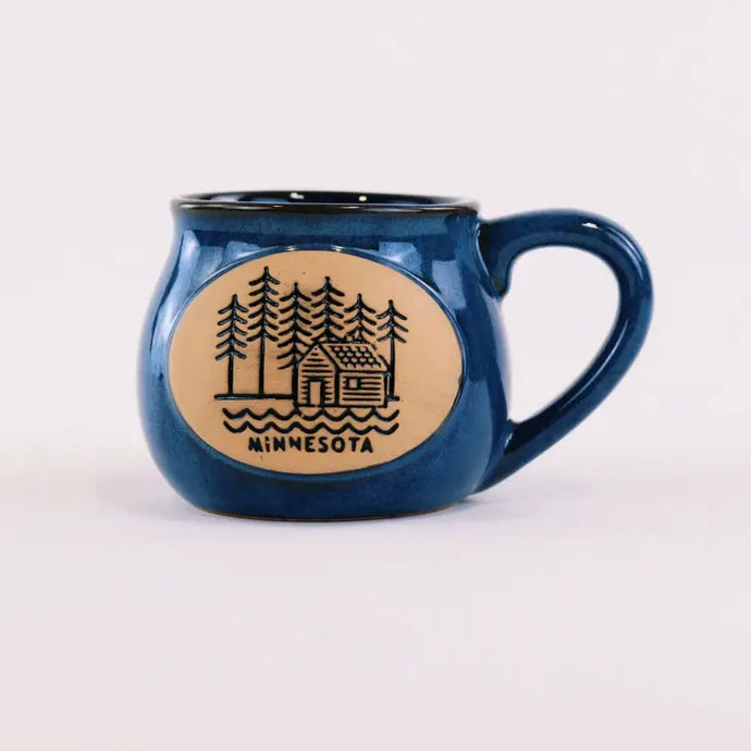 Blue potbelly mug with Minnesota cabin design