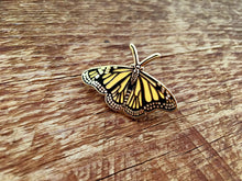 Load image into Gallery viewer, butterfly pin sitting on a table
