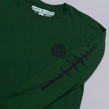 Load image into Gallery viewer, Sleeve view of the Green long sleeve shirt. Tree runs down the sleeve
