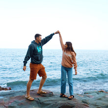 Load image into Gallery viewer, man and women wearing sweatshirts dancing by the lake
