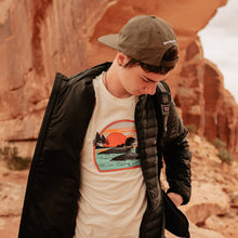 Load image into Gallery viewer, Boy wearing vintage loon t-shirt in front of canyon
