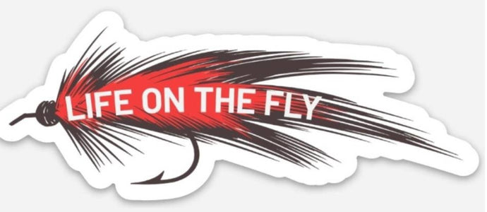 Fly fishing sticker that says life on the fly with a fly fishing fly
