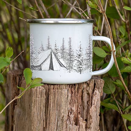 White enamel mug with tent and trees