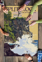 Load image into Gallery viewer, People putting split rock lighthouse puzzle togheter
