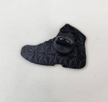 Load image into Gallery viewer, back of hiking boot pin that is black with geometric pattern
