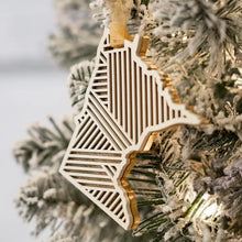 Load image into Gallery viewer, White and gold wooden ornament in shape of Minnesota.
