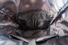 Load image into Gallery viewer, inside of backpack showing zipper pocket and pouches
