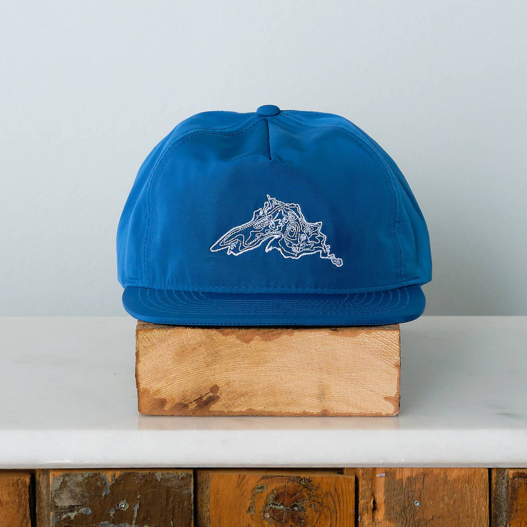 Snapback hat in blue with white Lake Superior contour embroidered on front