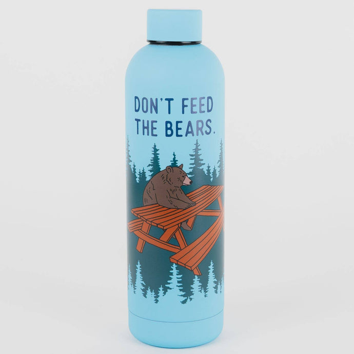Blue water bottle with a bear sitting at a picnic table that says Don't feed the bears