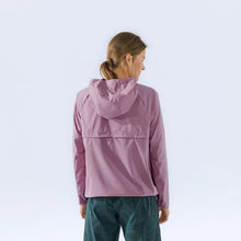 Load image into Gallery viewer, Woman facing away wearing pink or lavender windbreaker
