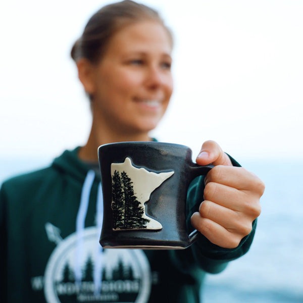 Minnesota pottery mug with pine trees