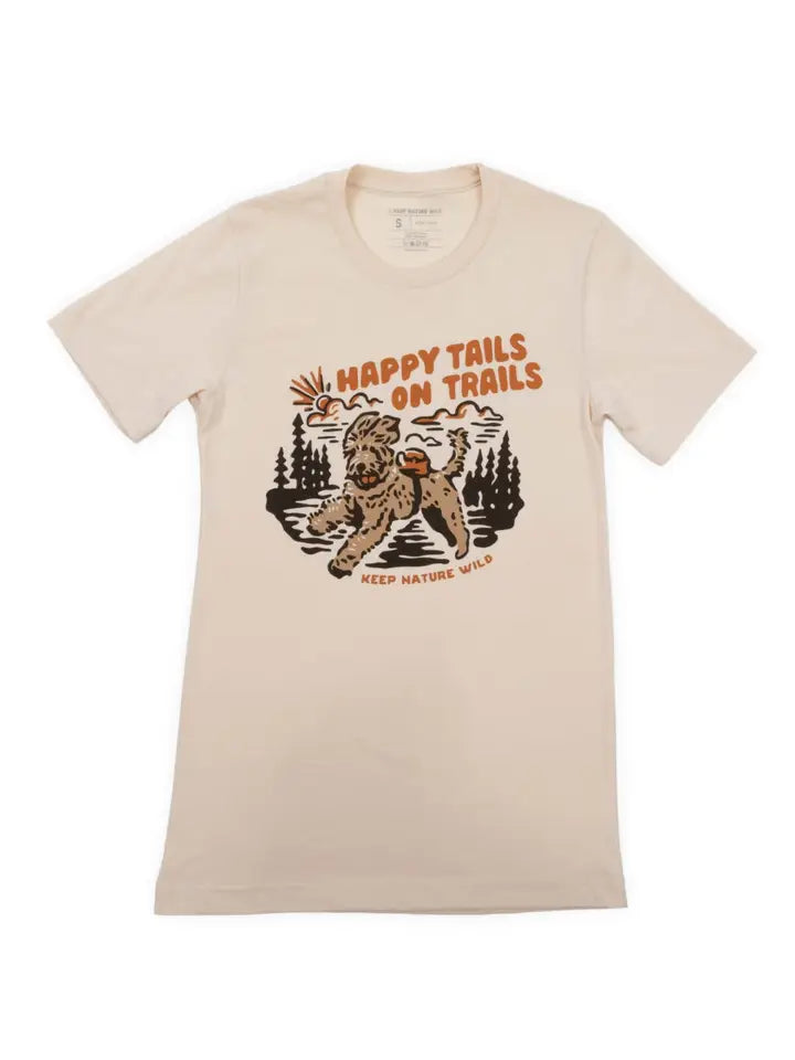 beige shirt with dog running through trees that says happy tails on trails