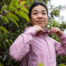 Load image into Gallery viewer, Model wearing berry blush windbreaker outside
