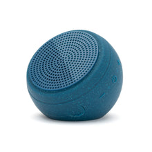 Load image into Gallery viewer, blue speckled waterproof speaker with sunction cup base removed from bottom
