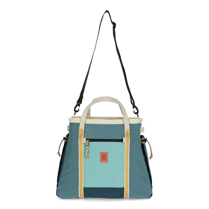 Large bag with shoulder and hand straps that is sea blue with yellow and an accents