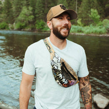 Load image into Gallery viewer, man walking by river with fanny pack around chest
