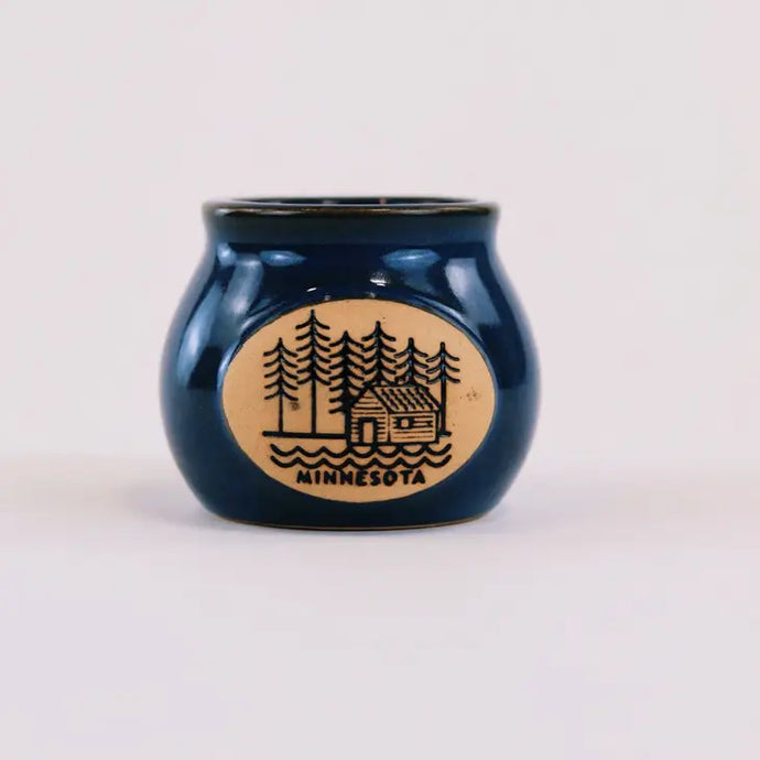 Minnesota pot belly shot glass. Blue with cabin design