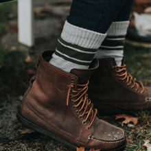 Load image into Gallery viewer, Great lakes cabin socks on a foot inside leather boots
