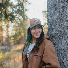 Load image into Gallery viewer, Girl wearing hat with three trees on it

