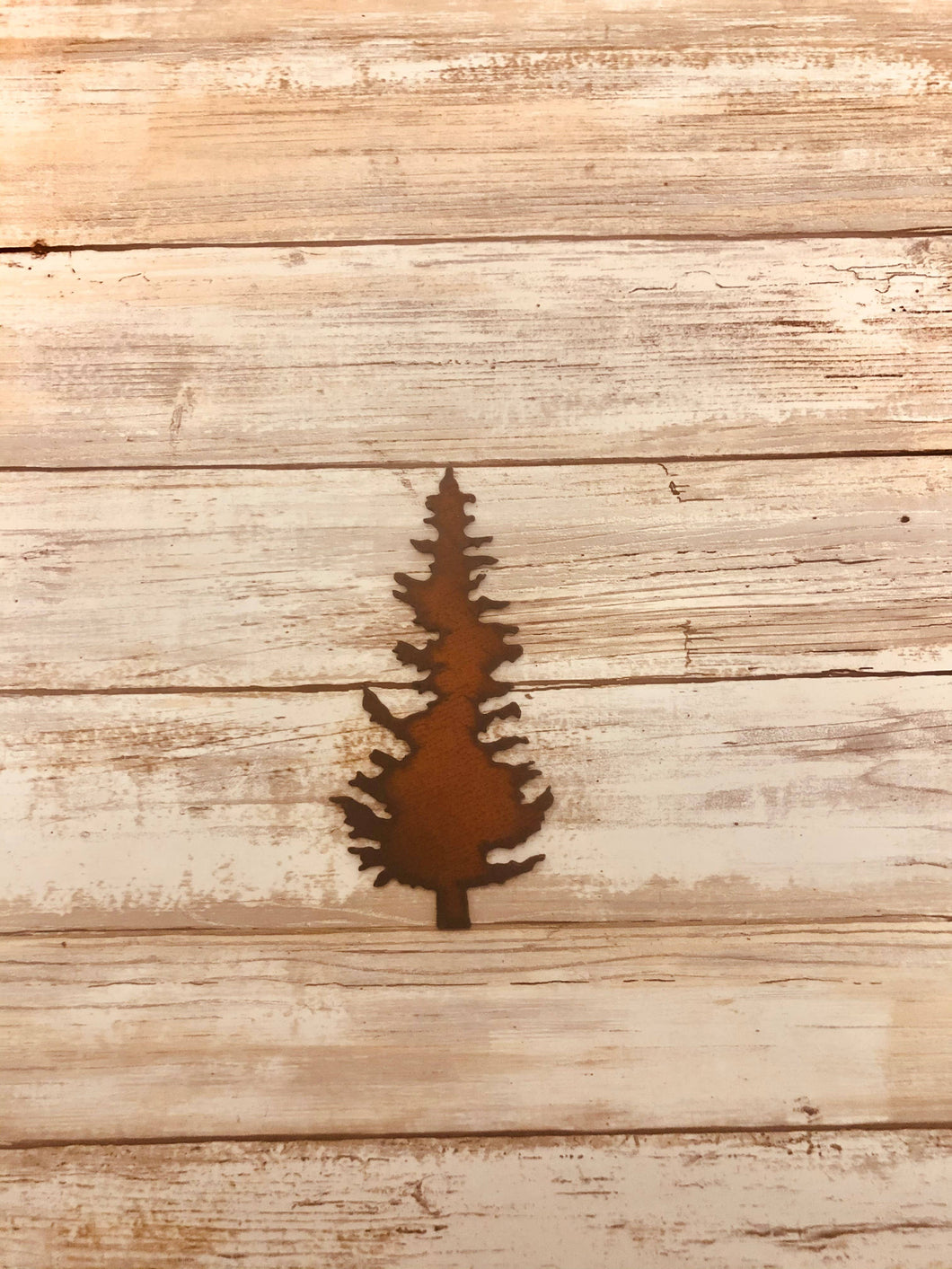 evergreen tree magnet made out of iron