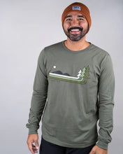 Load image into Gallery viewer, Man wearing orange beanie hat and olive green Keep Nature Wild shirt with trees on it
