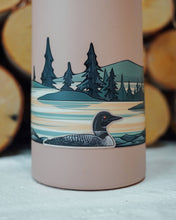 Load image into Gallery viewer, Infinity sticker that shows loon sticker on water in front of trees and hill
