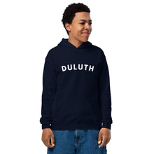 Load image into Gallery viewer, boy wearing navy sweatshirt that says Duluth in white

