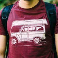 Load image into Gallery viewer, man wearing maroon t-shirt with canoe and jeep
