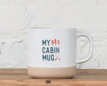 Load image into Gallery viewer, My Cabin Mug with cross paddles and trees
