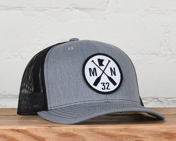 Gray and black Sota hat with MN and cross paddle patch on front